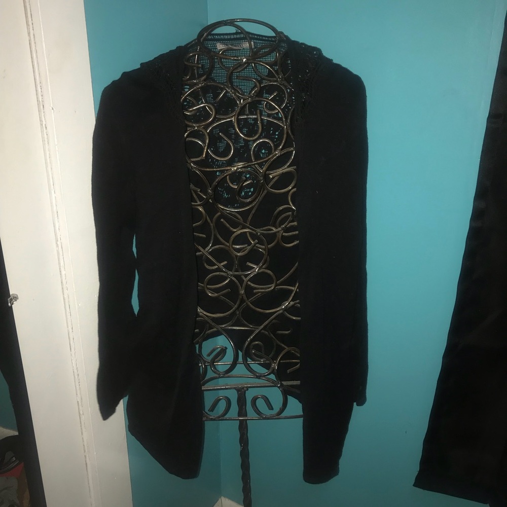 Black long sleeved Valerie Steven cardigan.